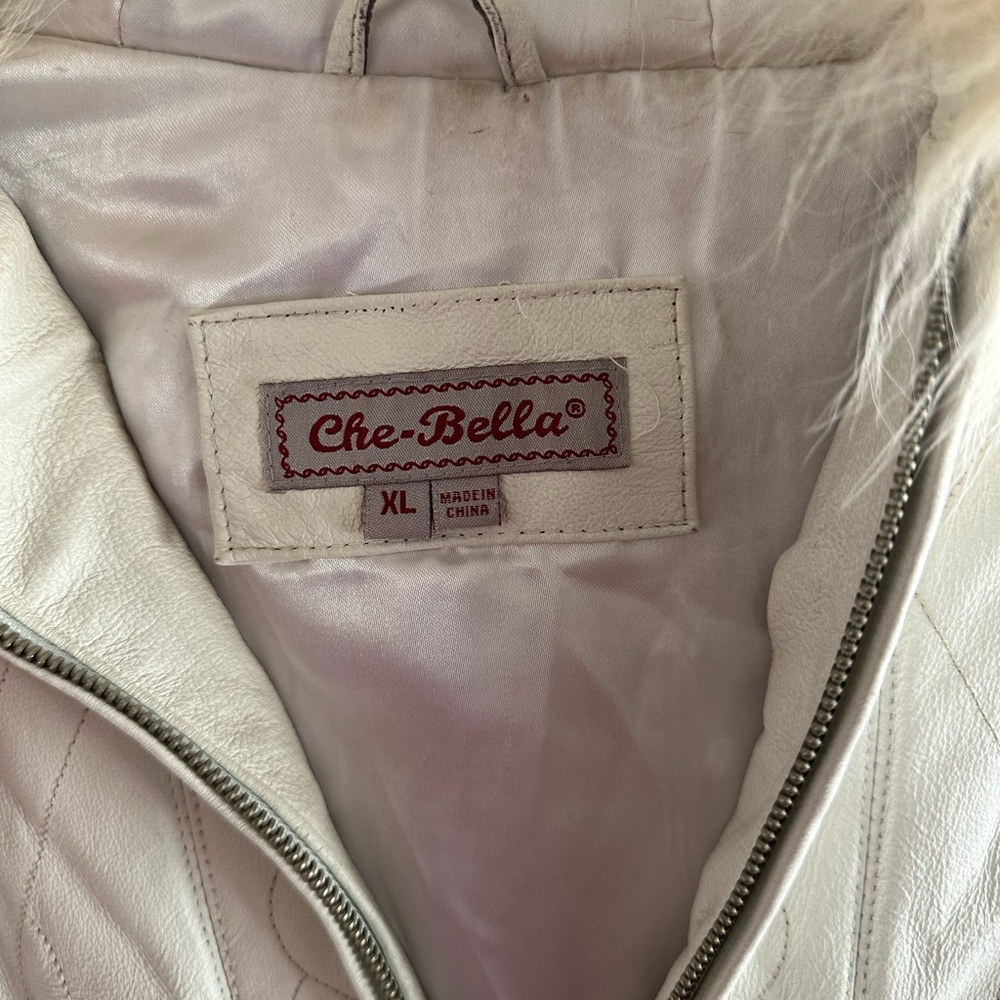 White leather jacket with fur hood